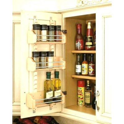 kitchen cabinet being used for storage