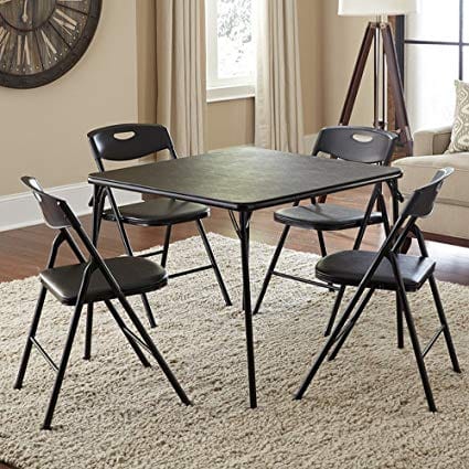 saving kitchen space in an apartment fold up table and chairs in the living room