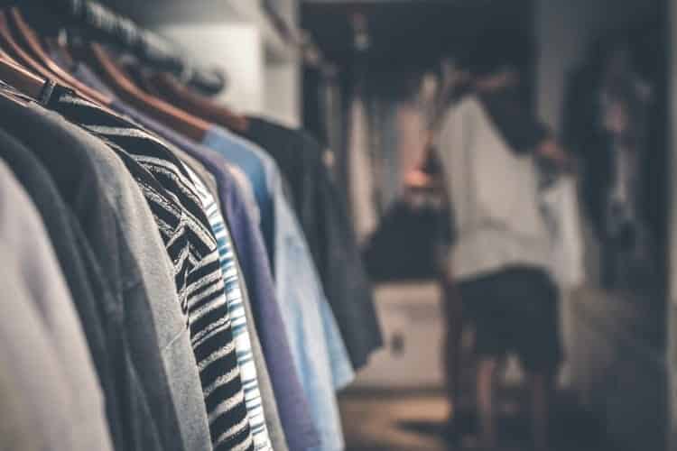 retail storage clothes hanging on a rack