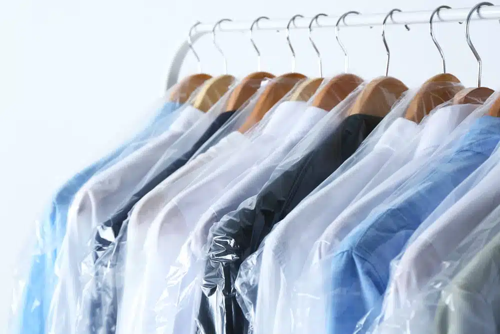 storing summer clothes tip nice shirts hung and covered with plastic for storage