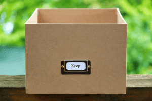 Cardboard box with the label "keep" on the front.