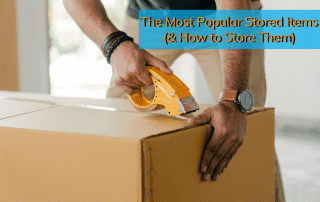 A man taping up a box with stored items inside.