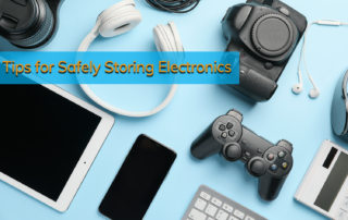Electronics (a mcamera, headphones, smart phones, keyboard, cables, tablet, game controller) on a light blue background for storing electronics.