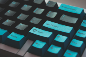 close up of a blue computer keyboard.