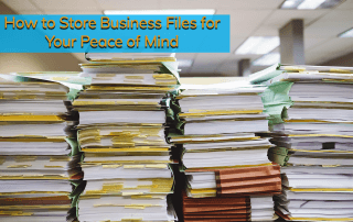 Business files stacked on top of each other in a company building.