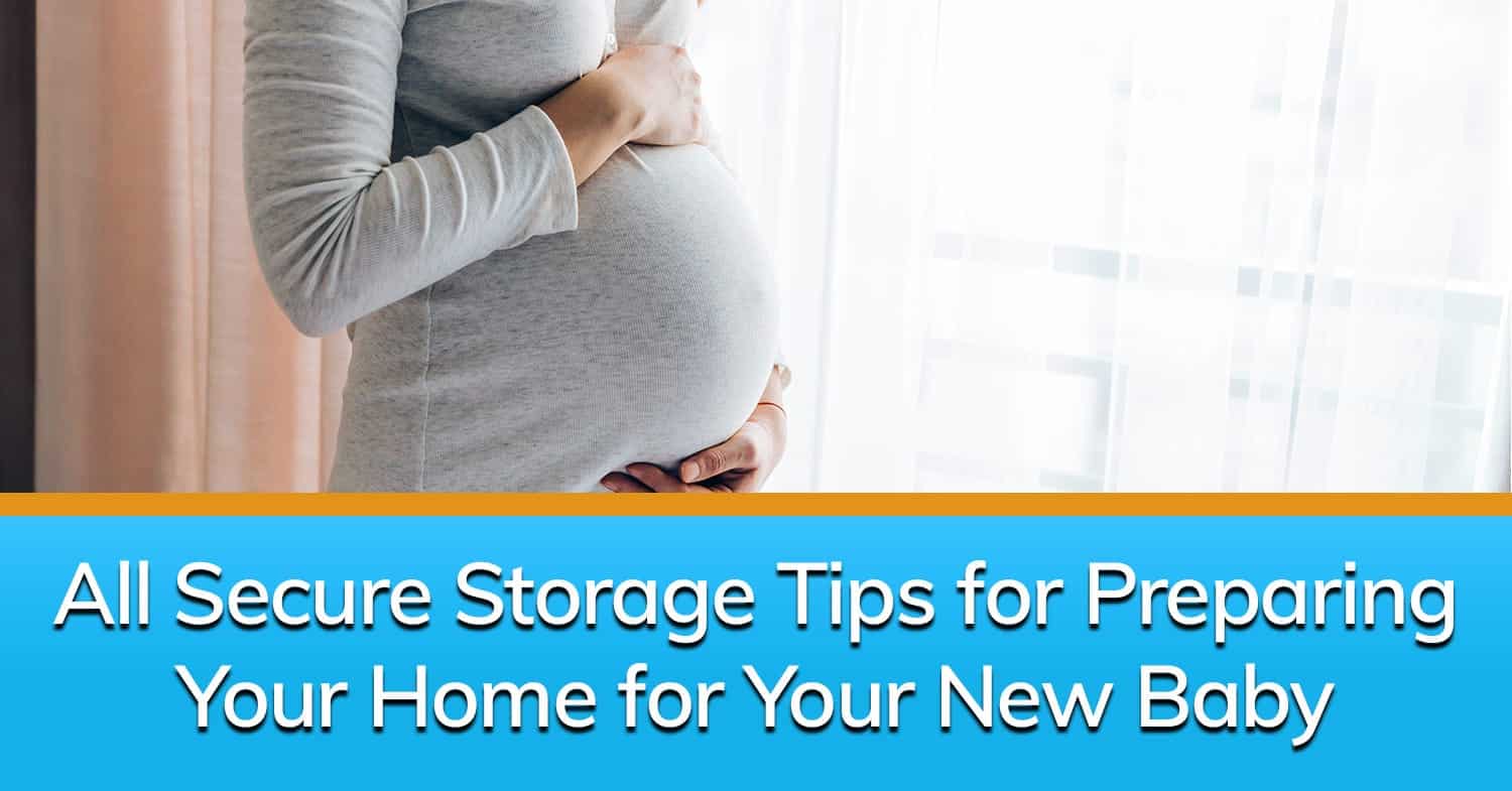 A woman holding her baby bump in front of a window, thinking about where to store her baby items.